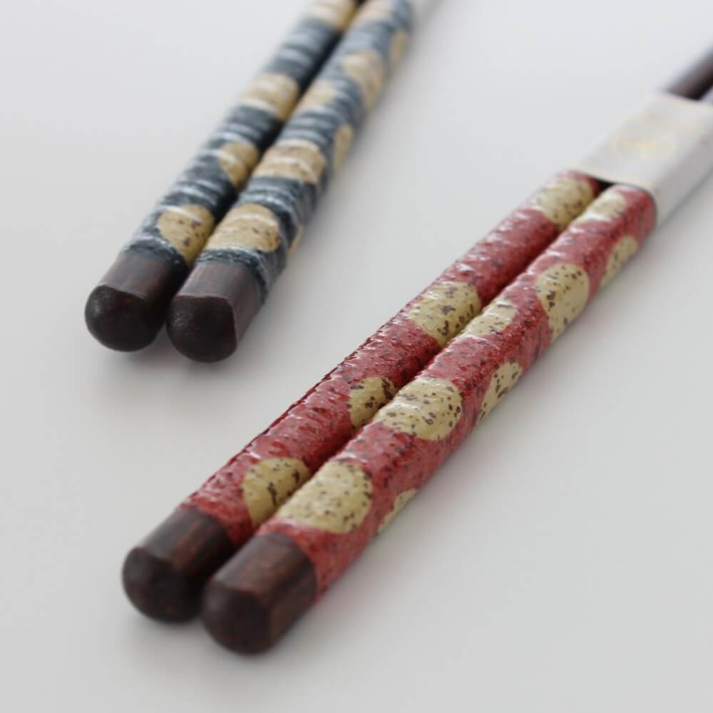 red mizutama chopsticks in the foreground