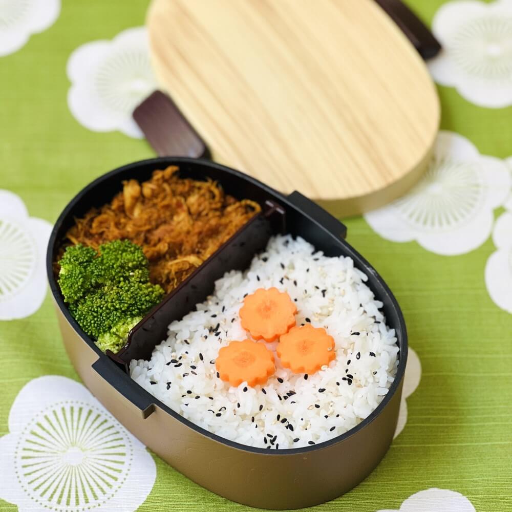 rice with south african curry inside mokume koban hinoki brown bento box