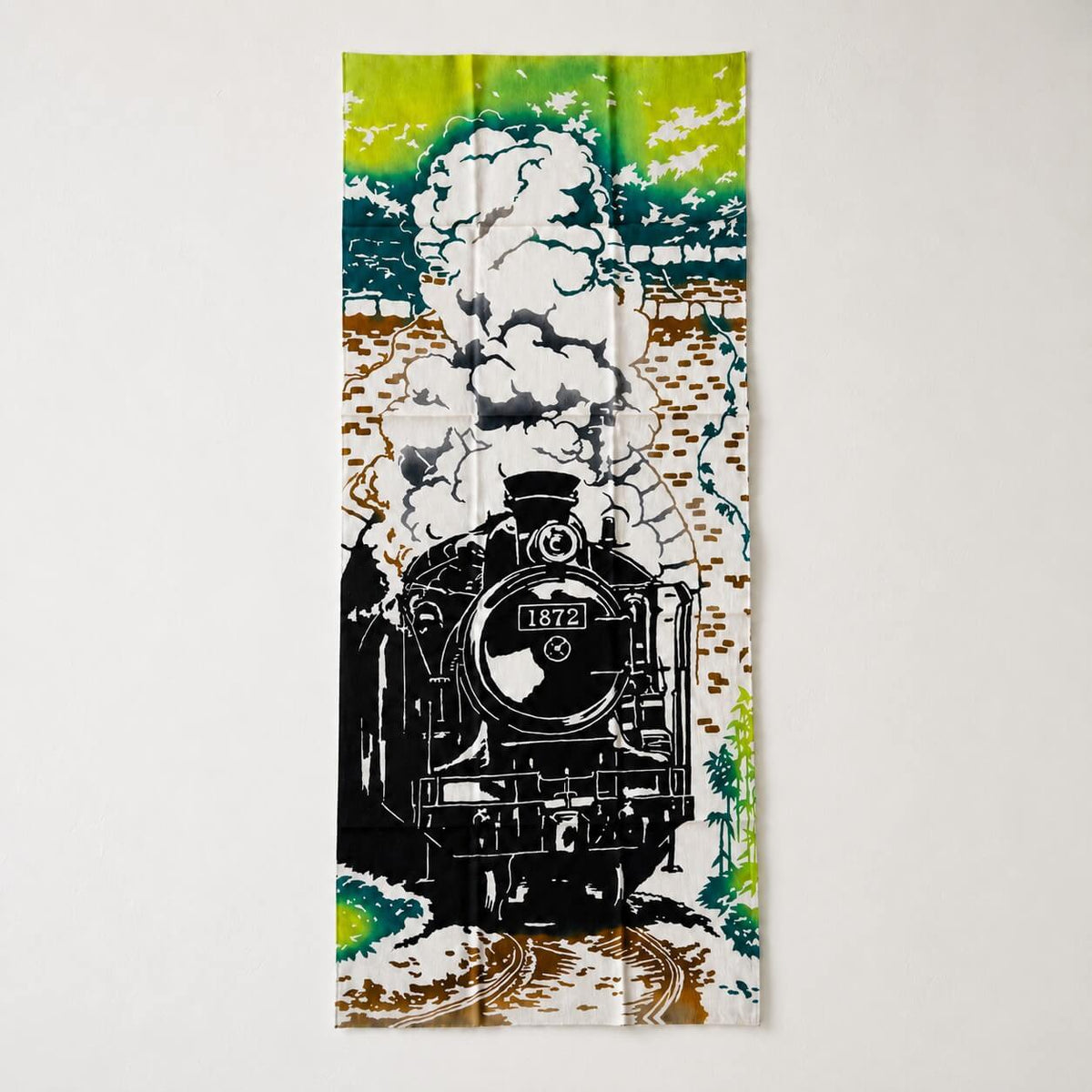 traditional tenugui with showing a steam locomotive emerging from a tunnel under vivid fresh greenery