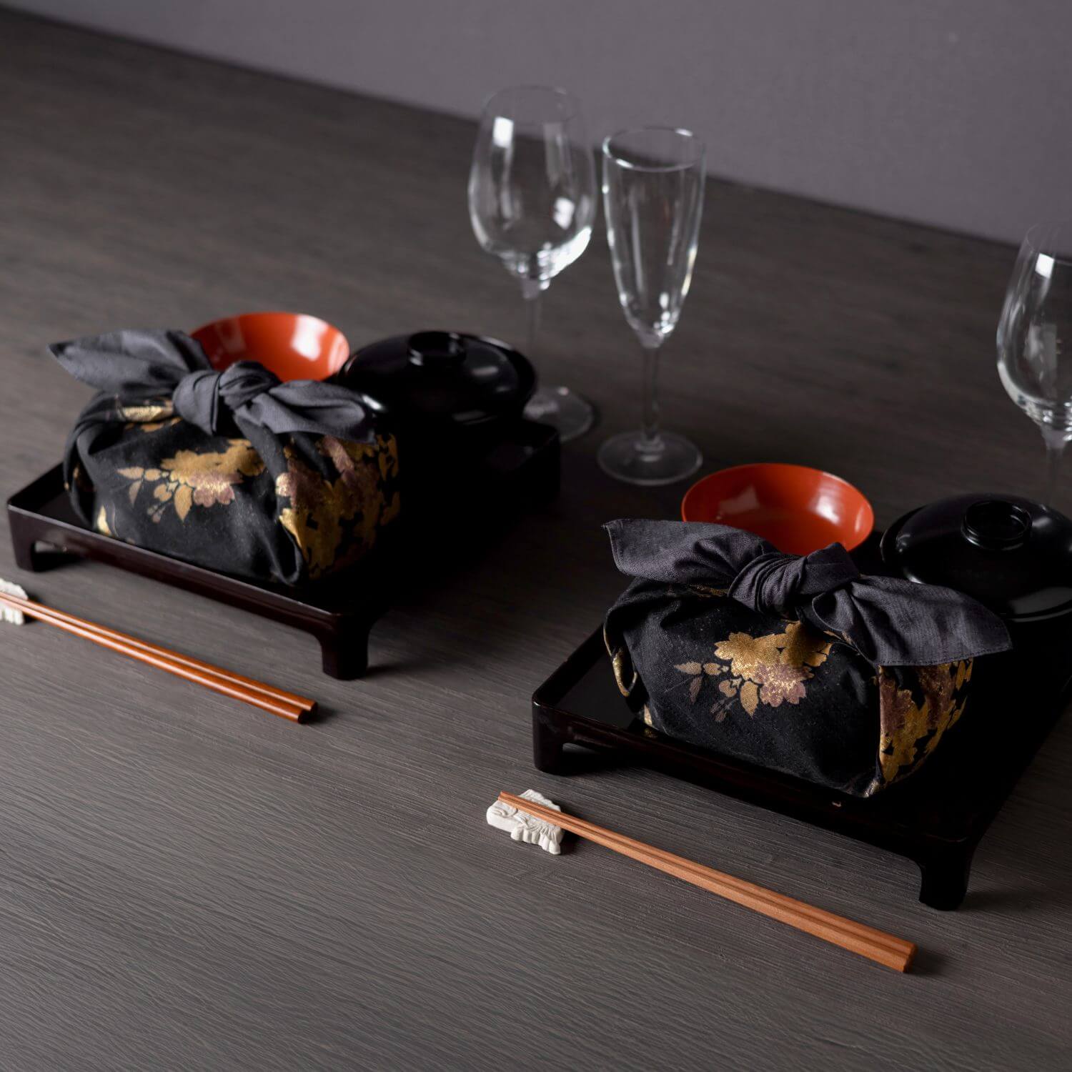 bento boxes wrapped in setsugekka bon sakura charcoal black furoshiki