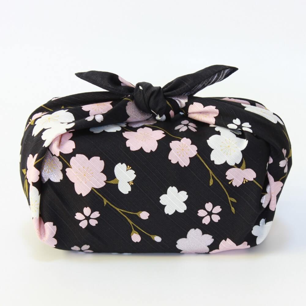 side profile bento box wrapped black sakura furoshiki