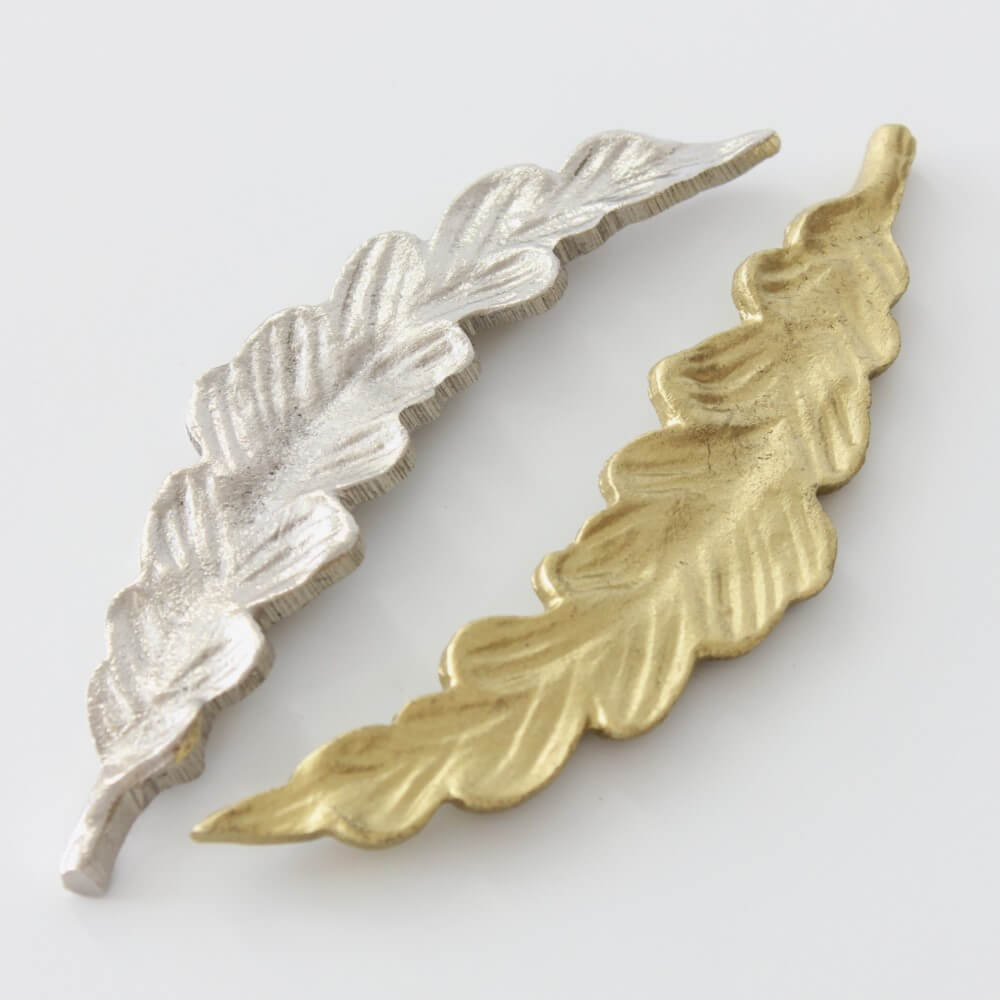 silver gold rucola leaves shaped chopsticks rests