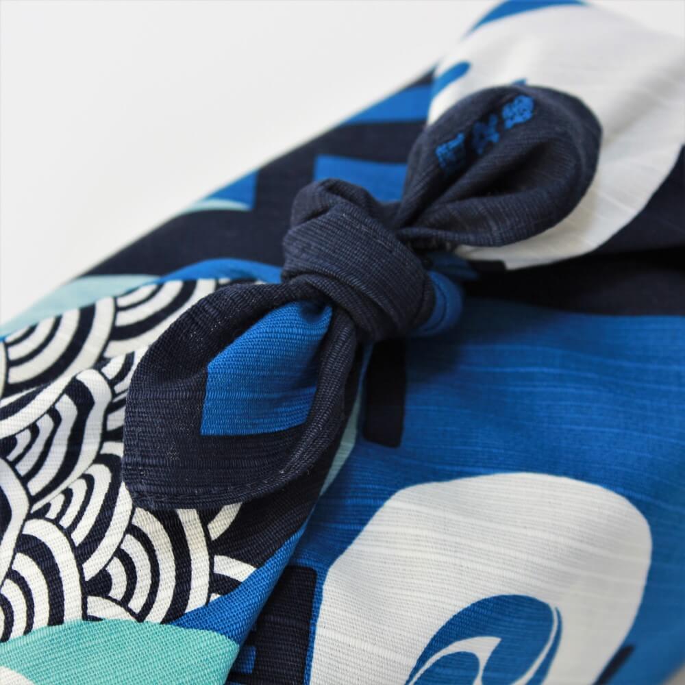 photo of tied knot blue furoshiki