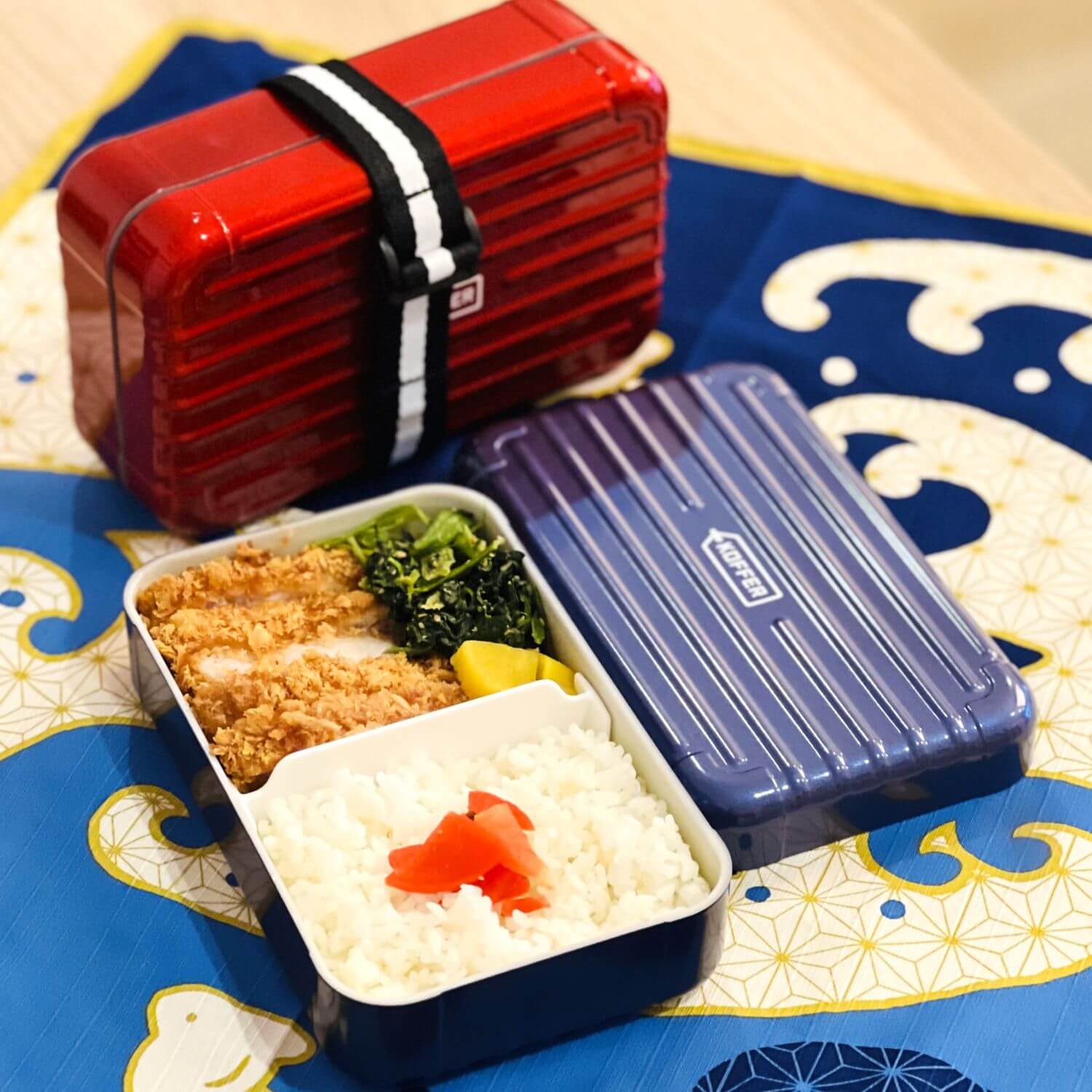 tonkatsu bento in navy suitcase bento box