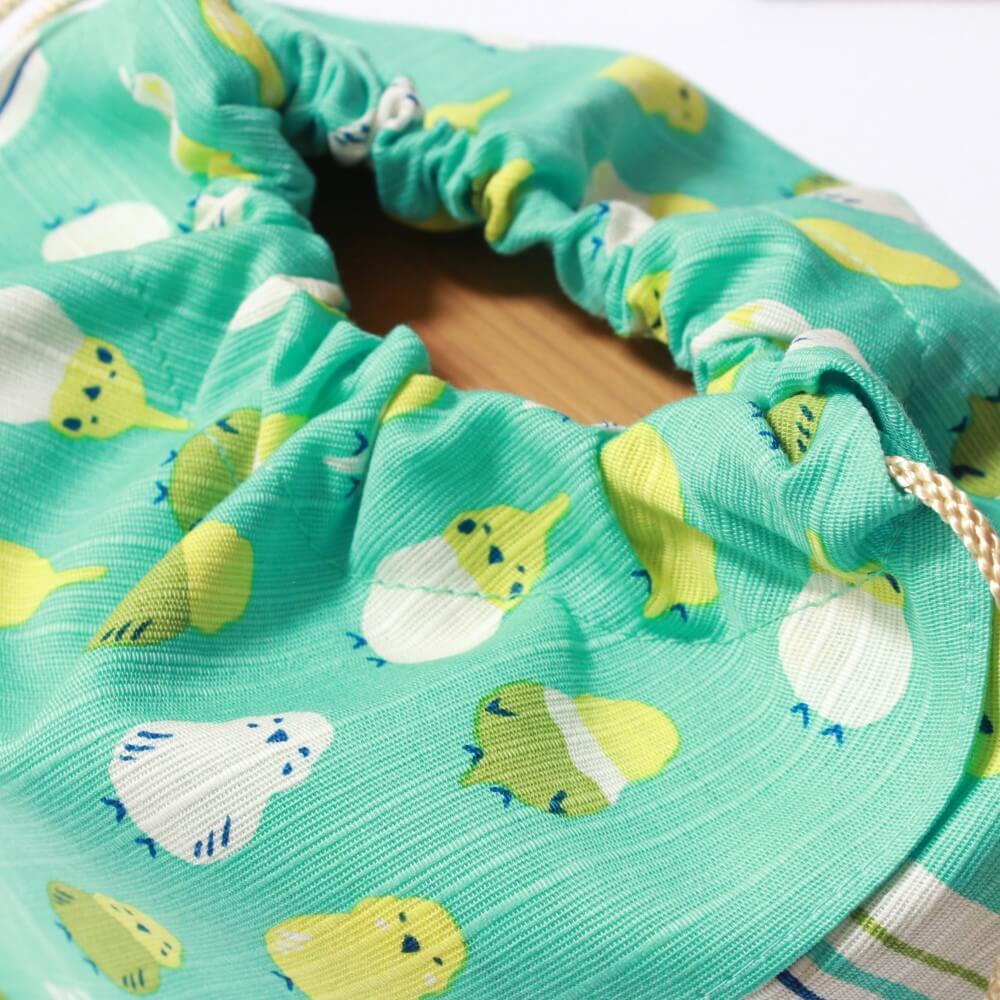 top of the parakeets bento lunch bag with drawstrings closed