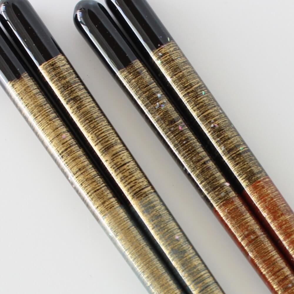 ultra close up of handles of mutsuki chopsticks showing detailed patterns