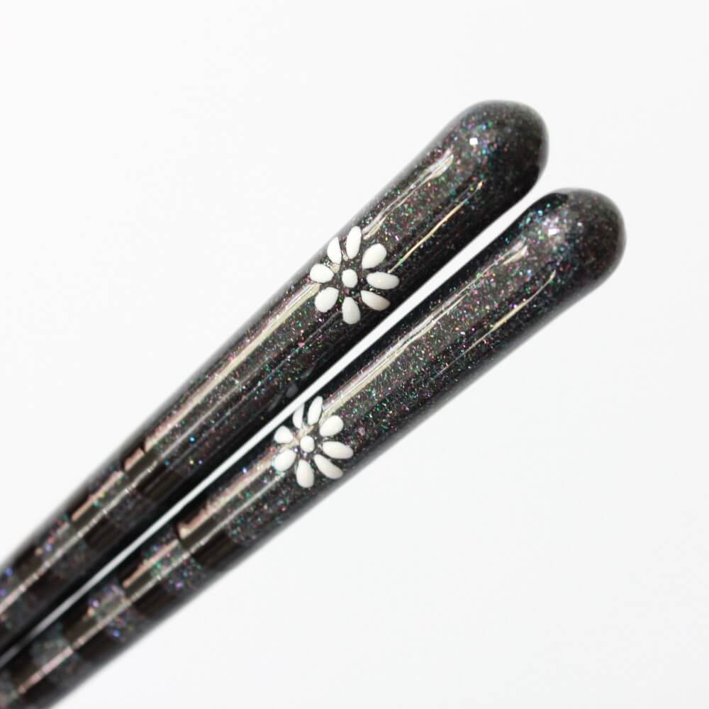 ultra close up showing patterns kainichirin black wood chopsticks