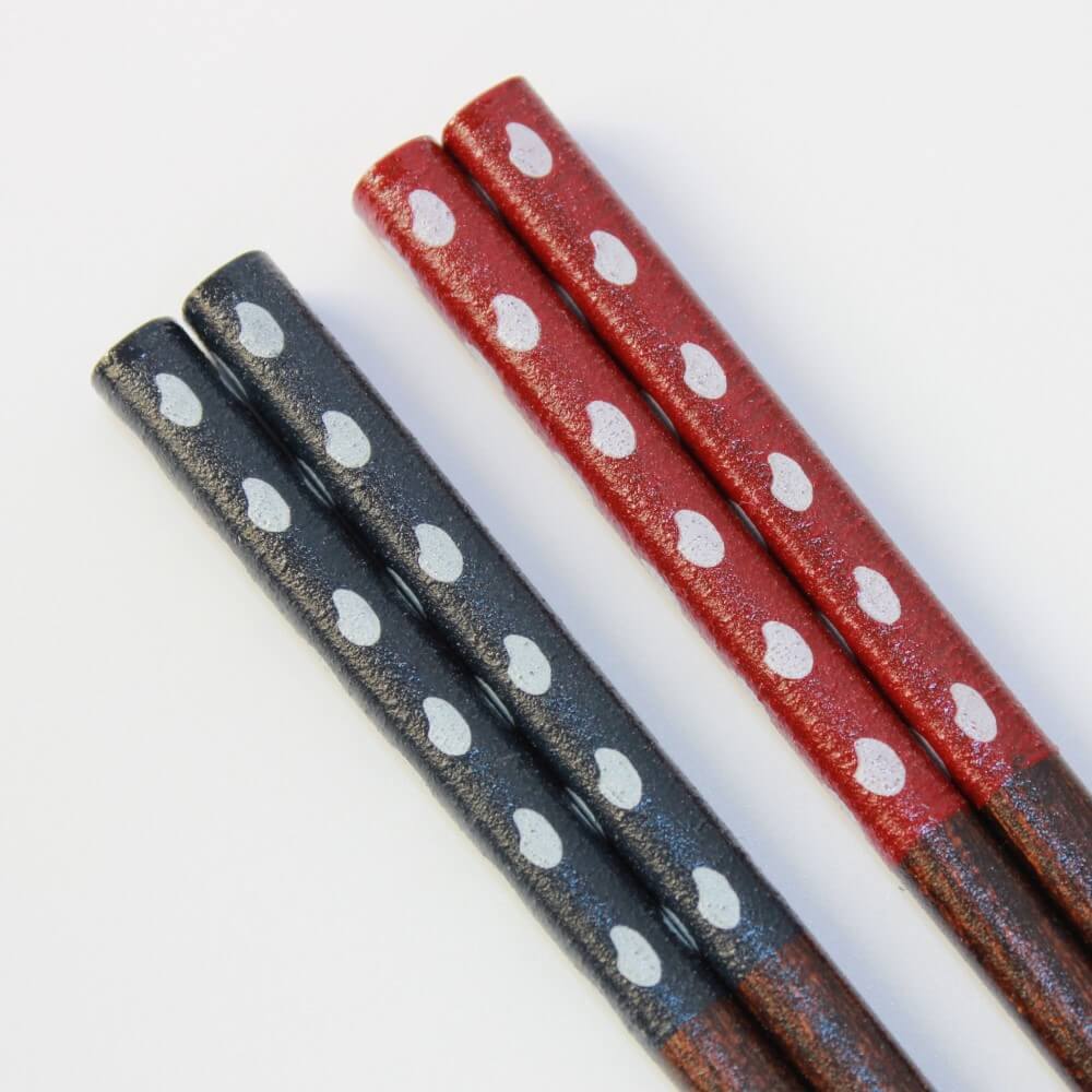 ultra close up showing rice grains okome chopsticks pair