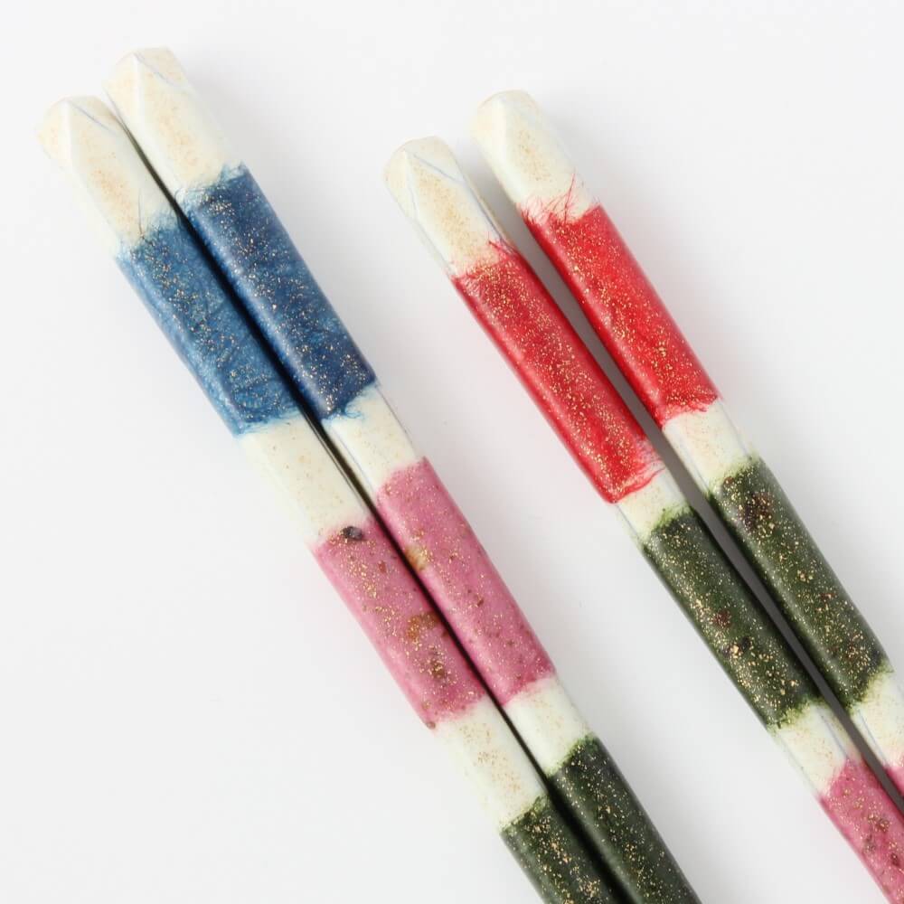 close up of the handles of the yuushin chopsticks showing vibrant colours
