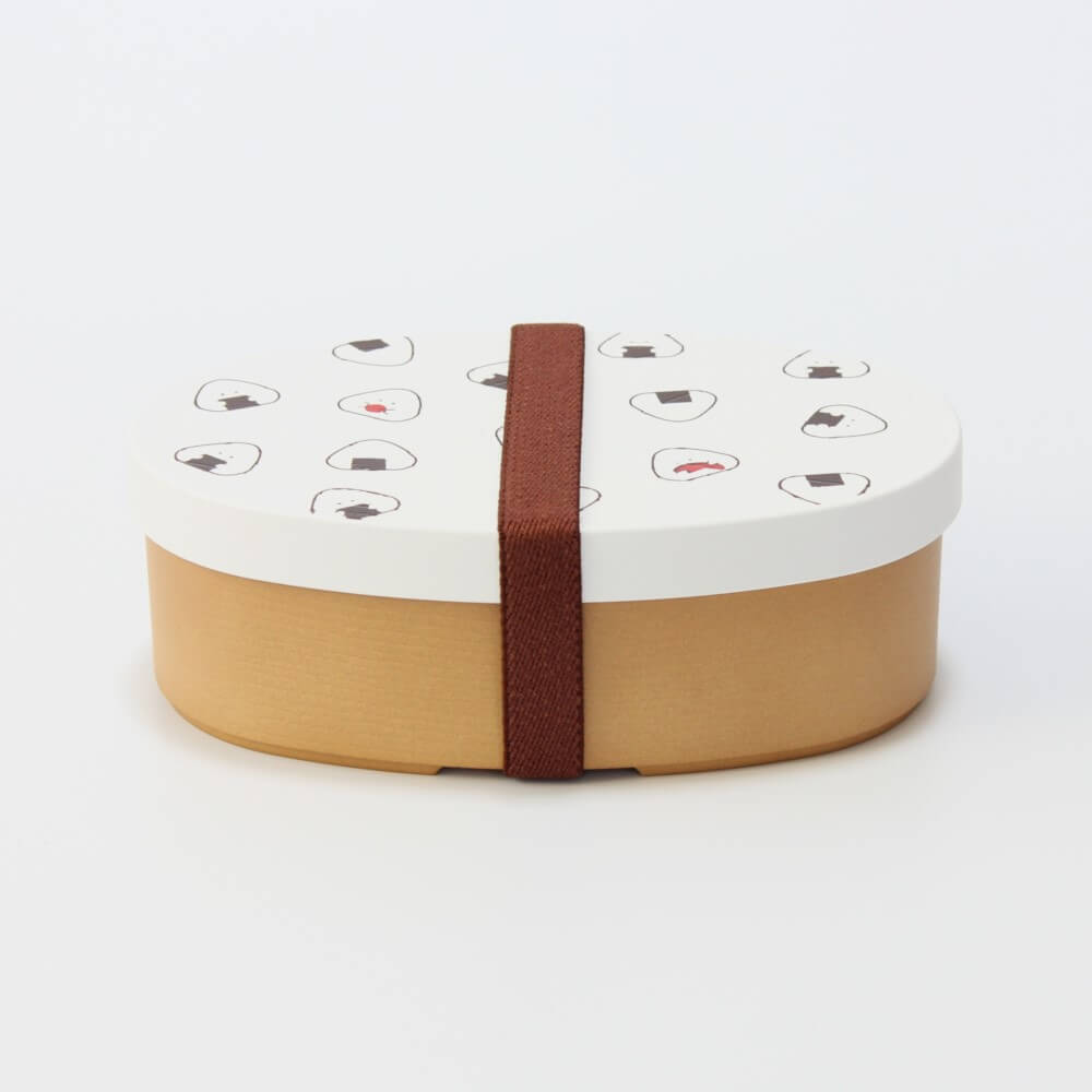 white gyutto onigiri bento box secured by band