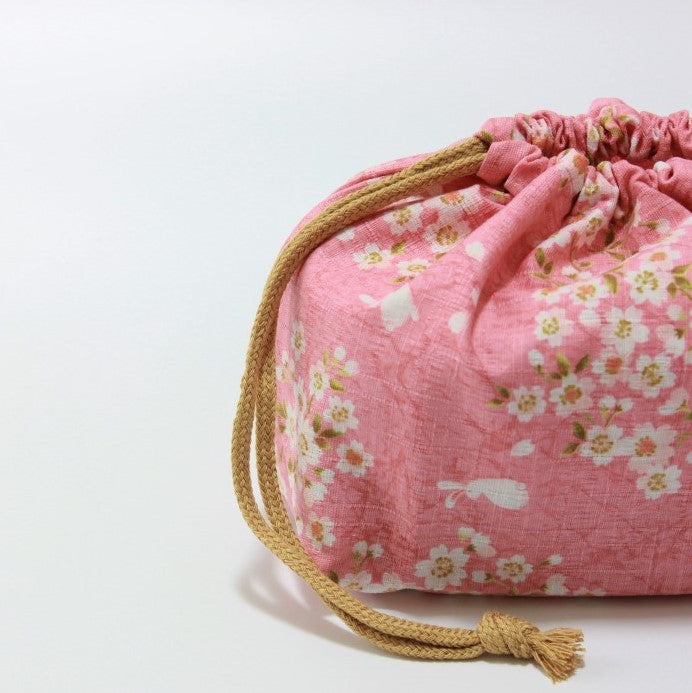 Sakura Usagi Pink lunch bag holding a bento box
