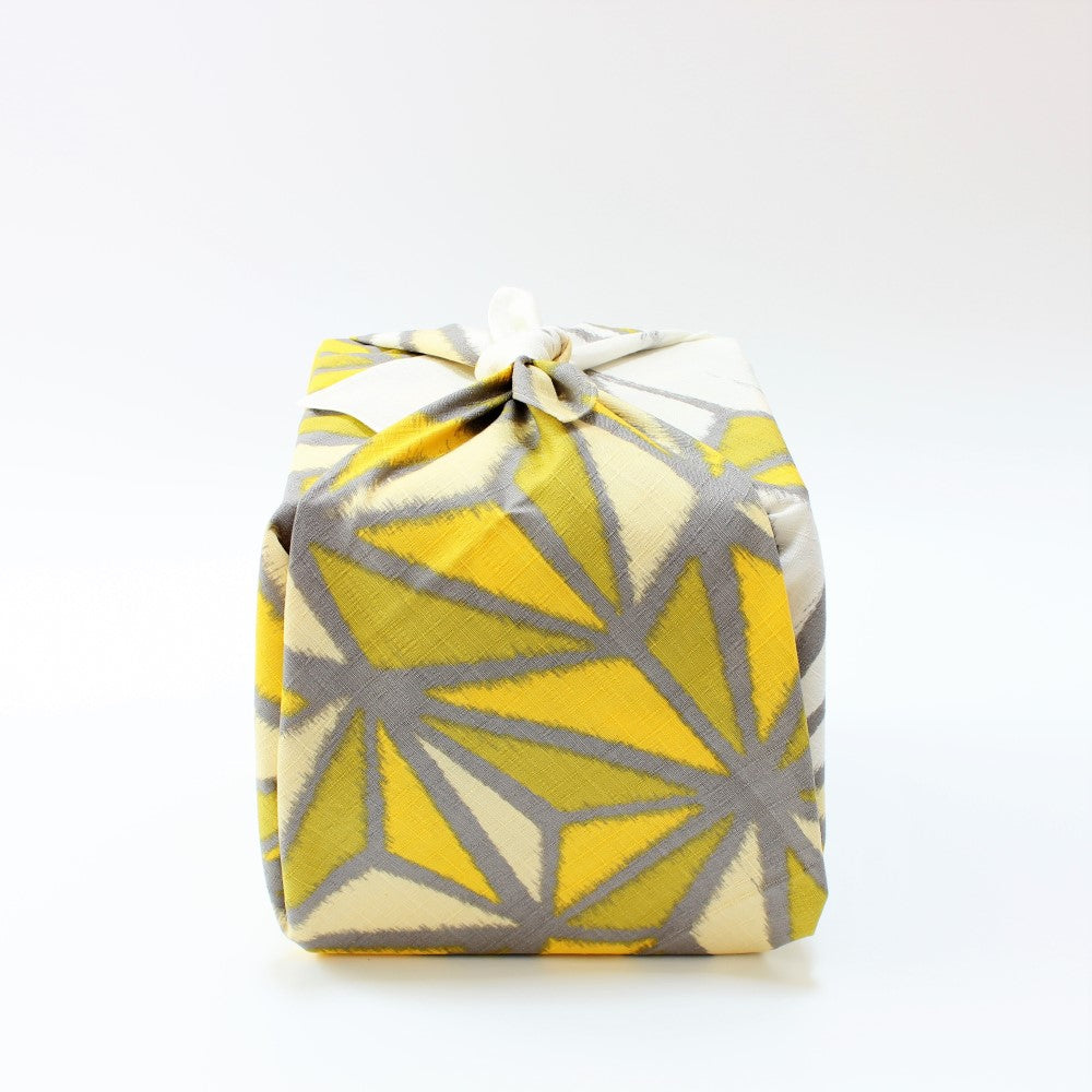 Side view of the Asanoha design Furoshiki from Japan wrapping a picnic bento box