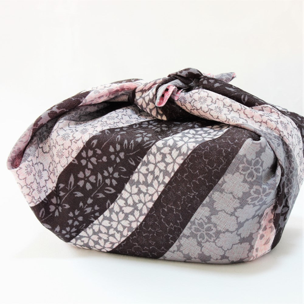 Reversible double sided furoshiki made in Japan. Shows a wrapped bento box