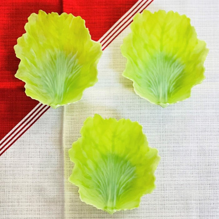 Overhead picture of 3 lettuce leaf oval shaped divider cups