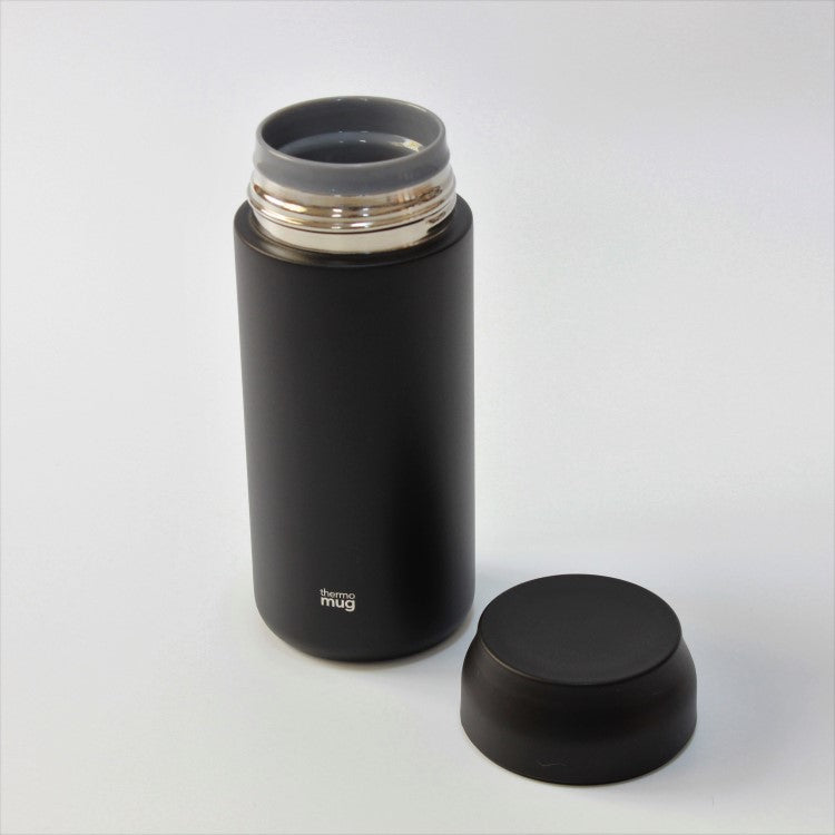 Top lid taken off showing inner lid still attached to the allday drink bottle