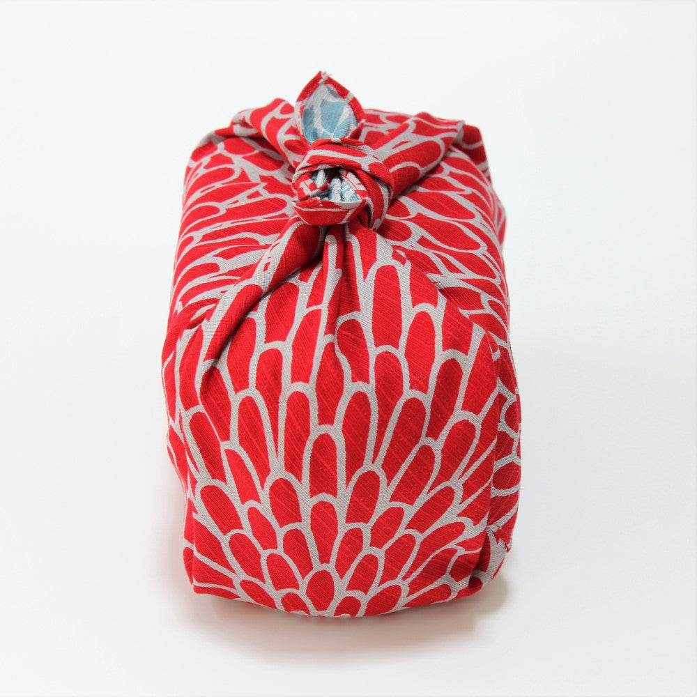 front view of bento box that has been wrapped in the Isa Monyo Chrysanthemum furoshiki from Majime Life
