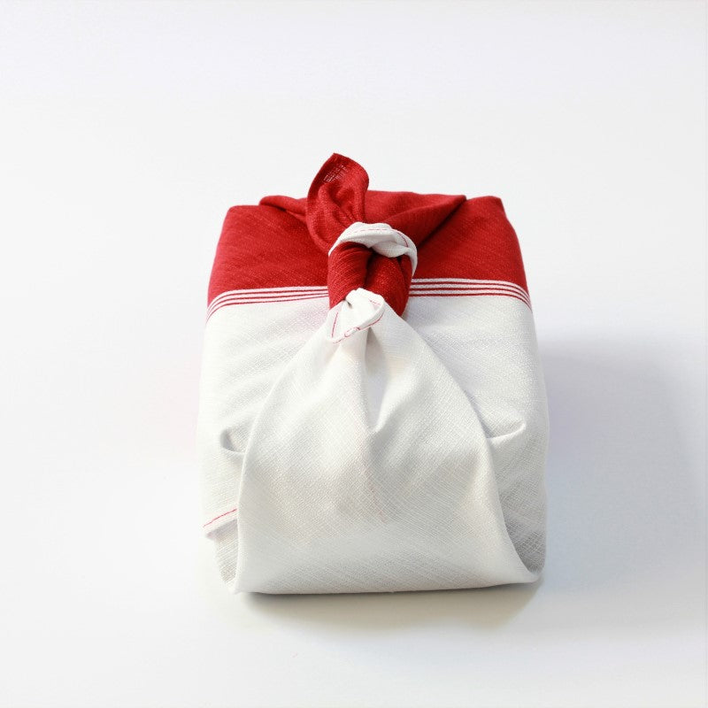 front view showing red and white colours of the hare tsutsumi wrapping cloth furoshiki