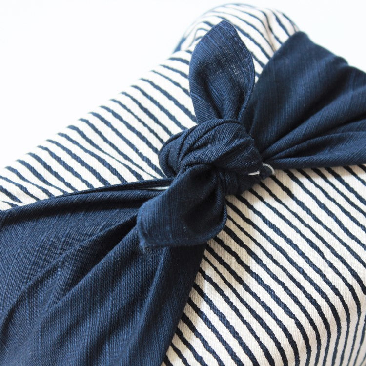 Close up showing the knot of a wrapped fursohiki