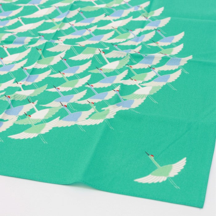 closer view of the cranes this turquoise coloured furoshiki