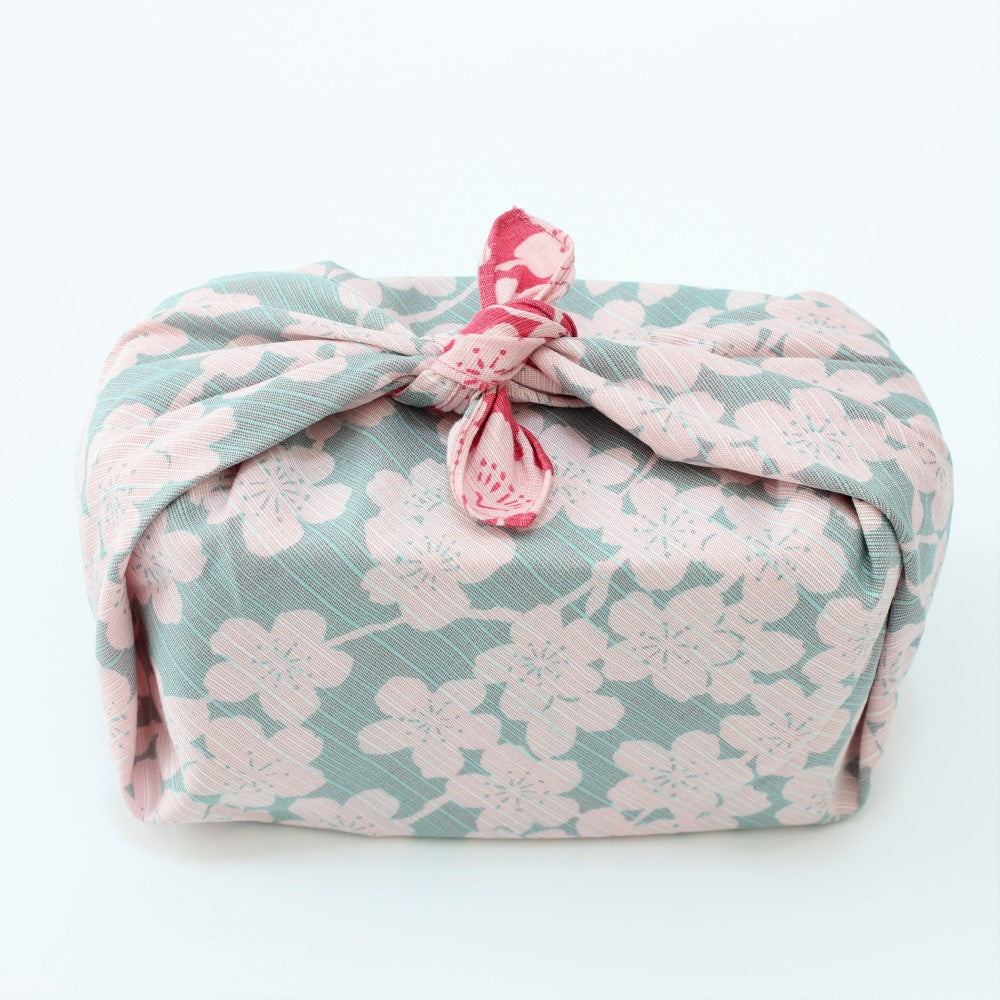 Full view of the blue side of Isa monyo furoshiki wrapping a bento box