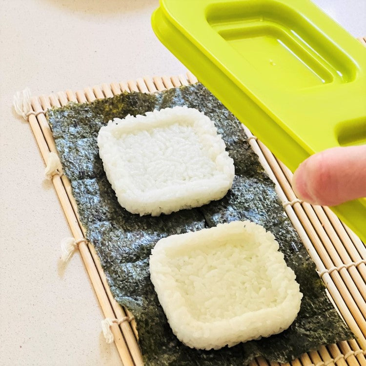 remove the moulds, leaving rice on the seaweed