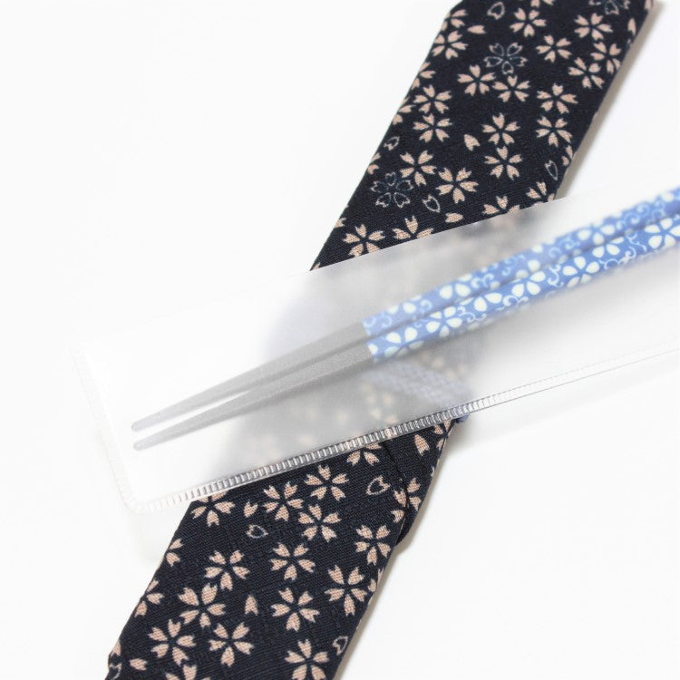 Close up showing the plastic cover with chopsticks inside