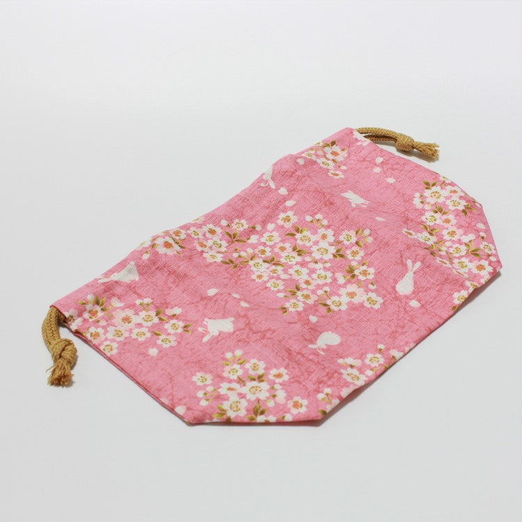 Sakura usagi pink lunch bag laid down straight for a photo shoot