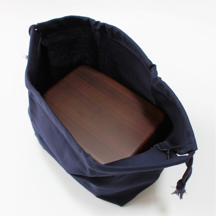 top view of opened bento lunch bag showing bento box inside