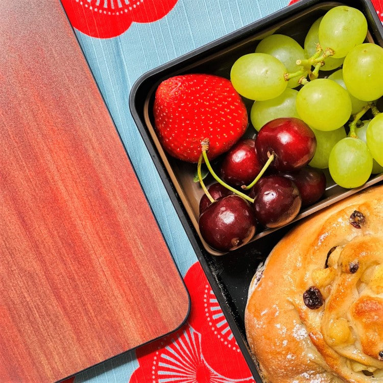 Fruit and apple scroll inside the rosewood woodgrain bento box