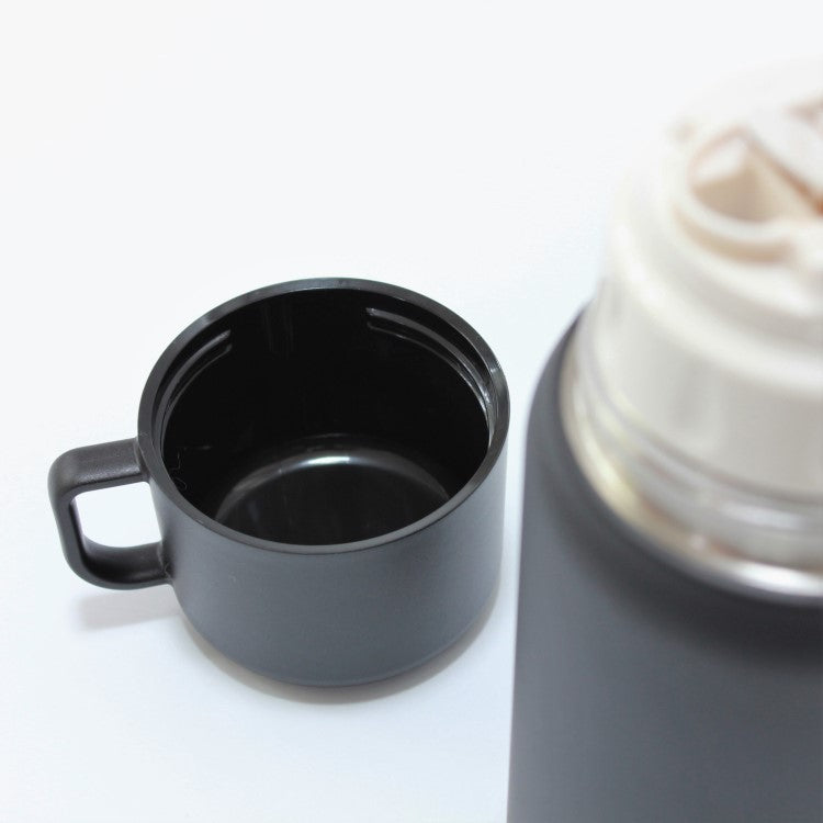 close up shot showing cup of the black trip drink bottle