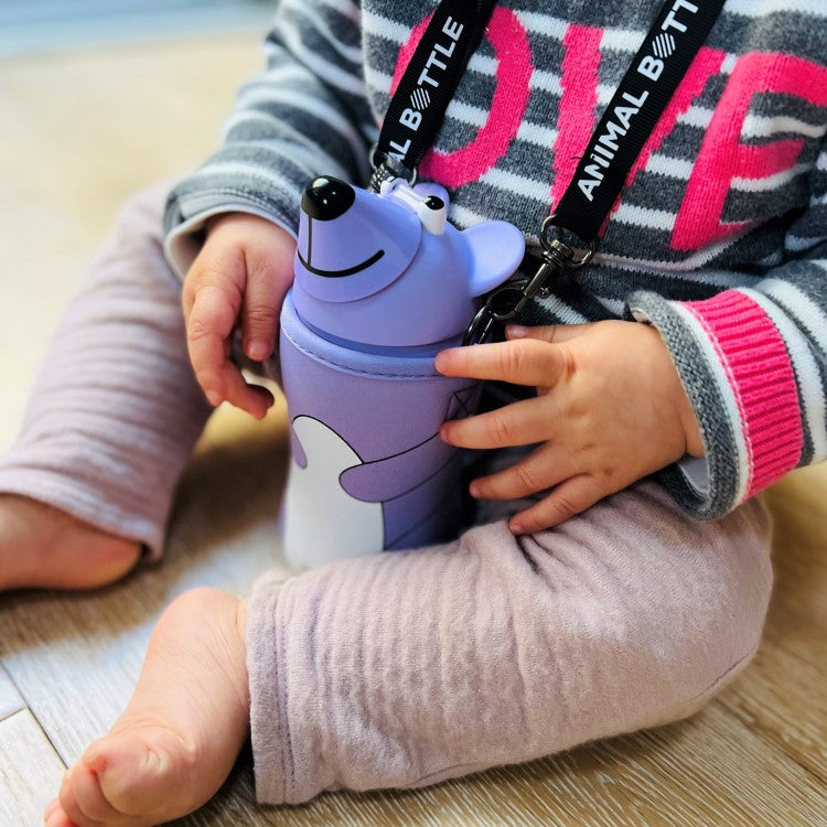 child holding the pale violet animal bear drink bottle by thermo mug