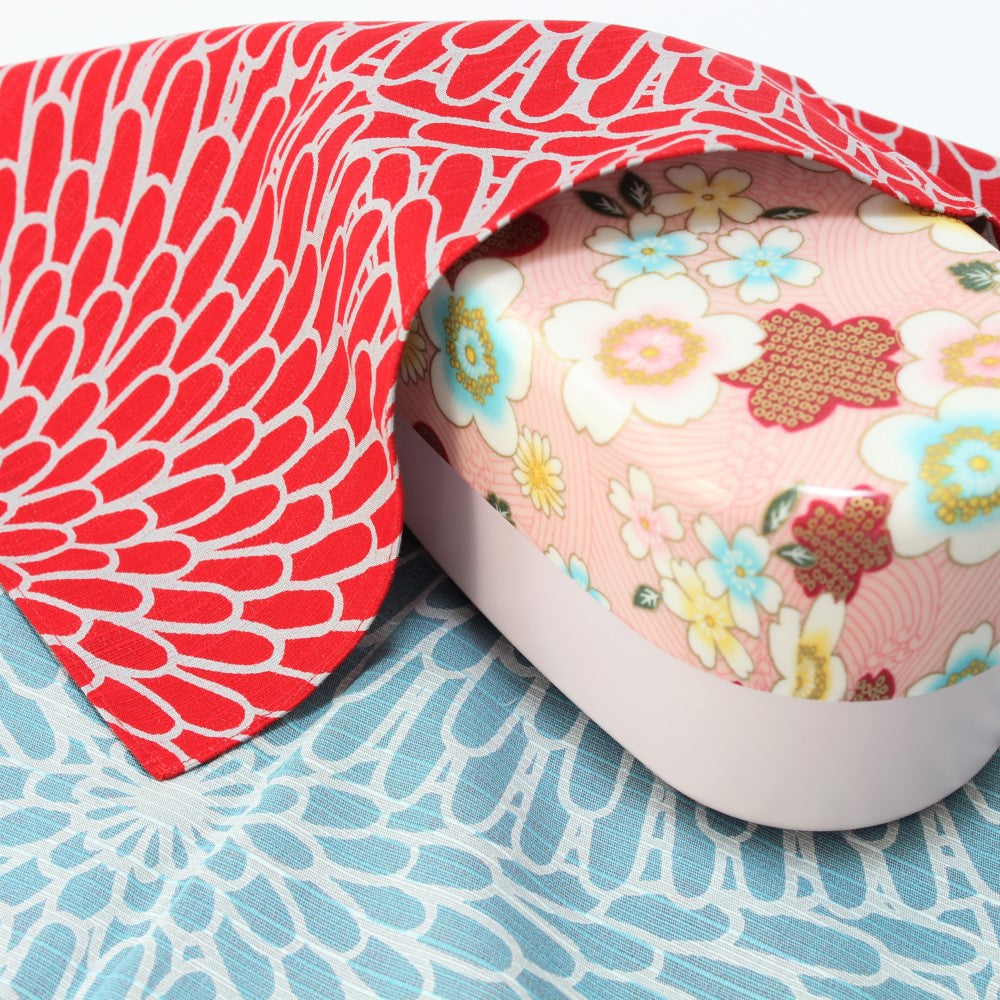 Image showing the furoshiki wrapped around the Kimono Sakura Pink 2 tier bento box. 