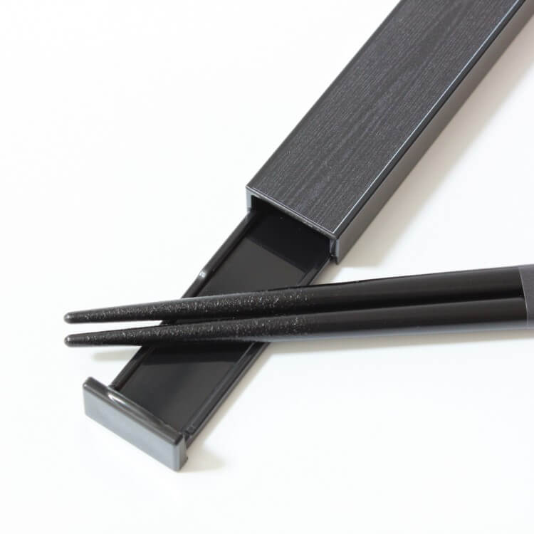 close up shot showing pointed tips of chopsticks