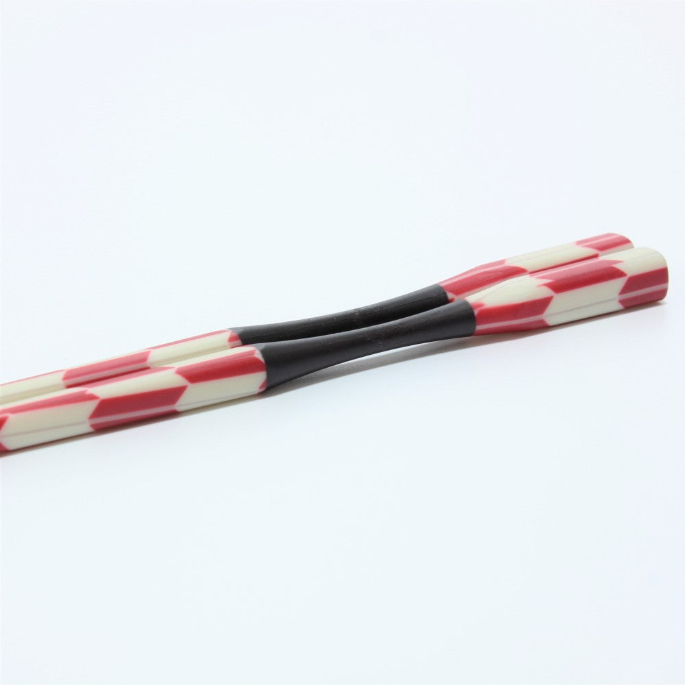 Side view of the curved necks of the Majime Life Ohashi Collection Chopsticks Yabane 