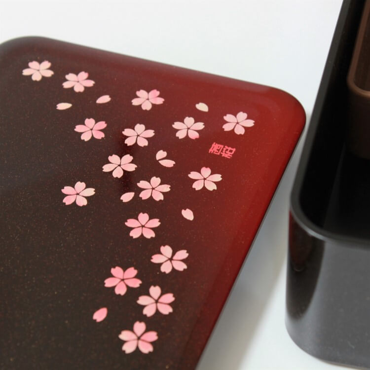 angled view of lid of sakura bento box