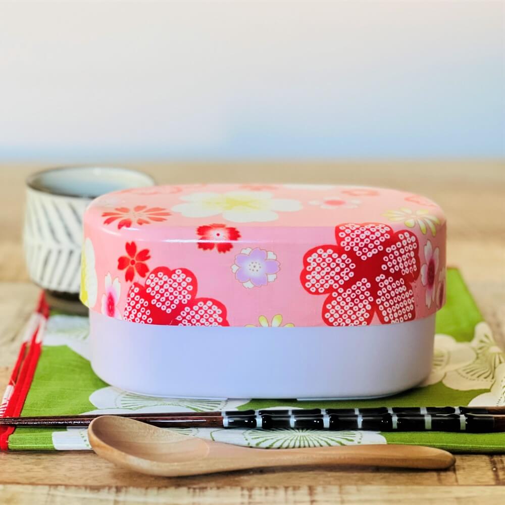 japanese bento box on table with furoshiki and chopsticks