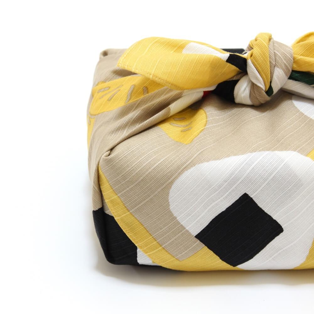 bento box wrapped in onigiri tsutsumi furoshiki