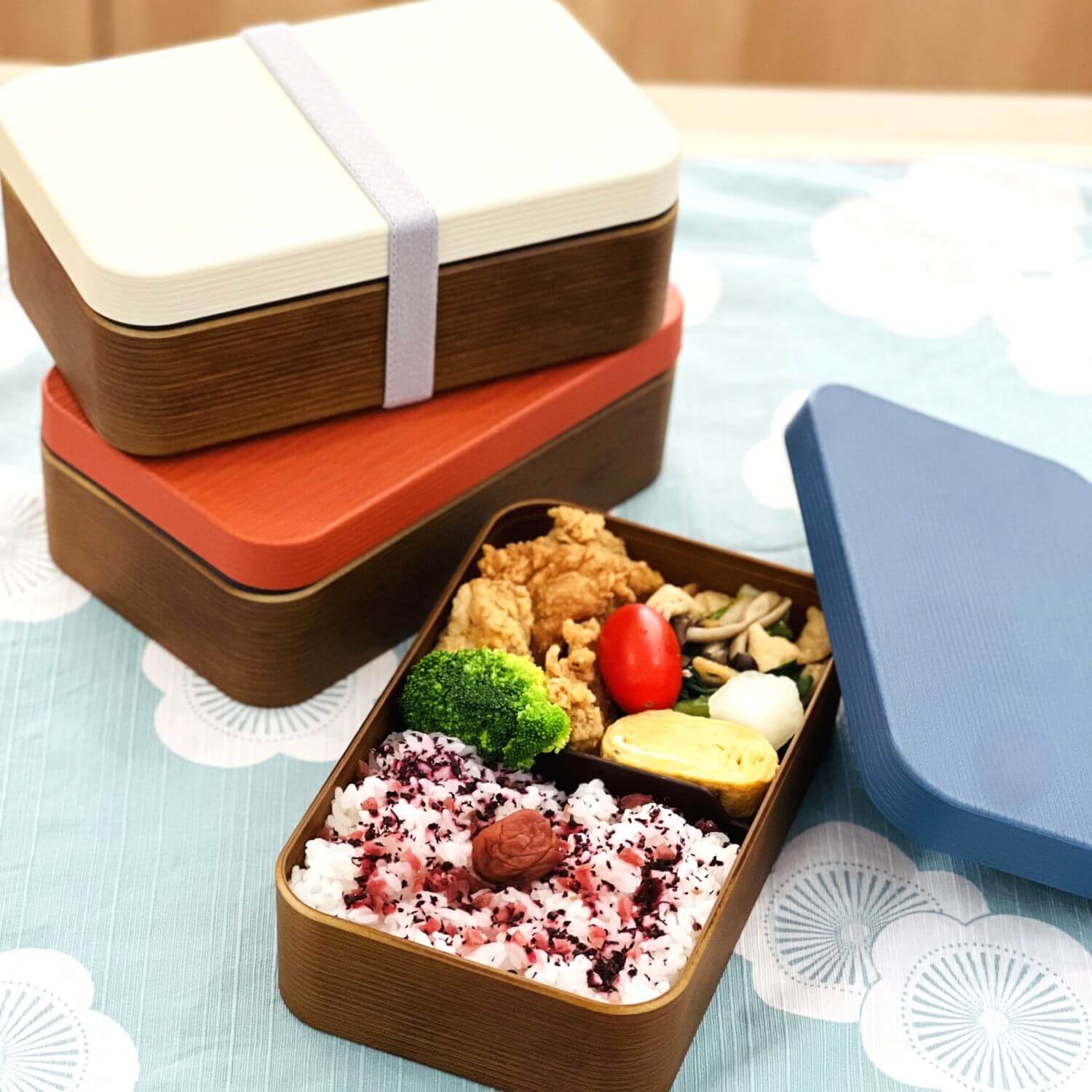 bento in woody plus bento box with extras in the background