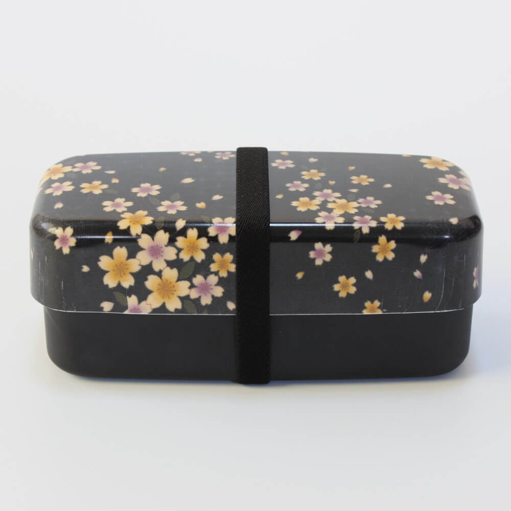 black bento box secured with elastic bento band