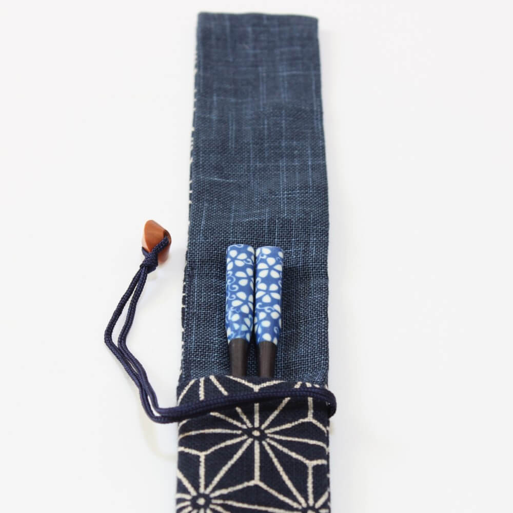 blue chopsticks inside fabric asanoha pattern case