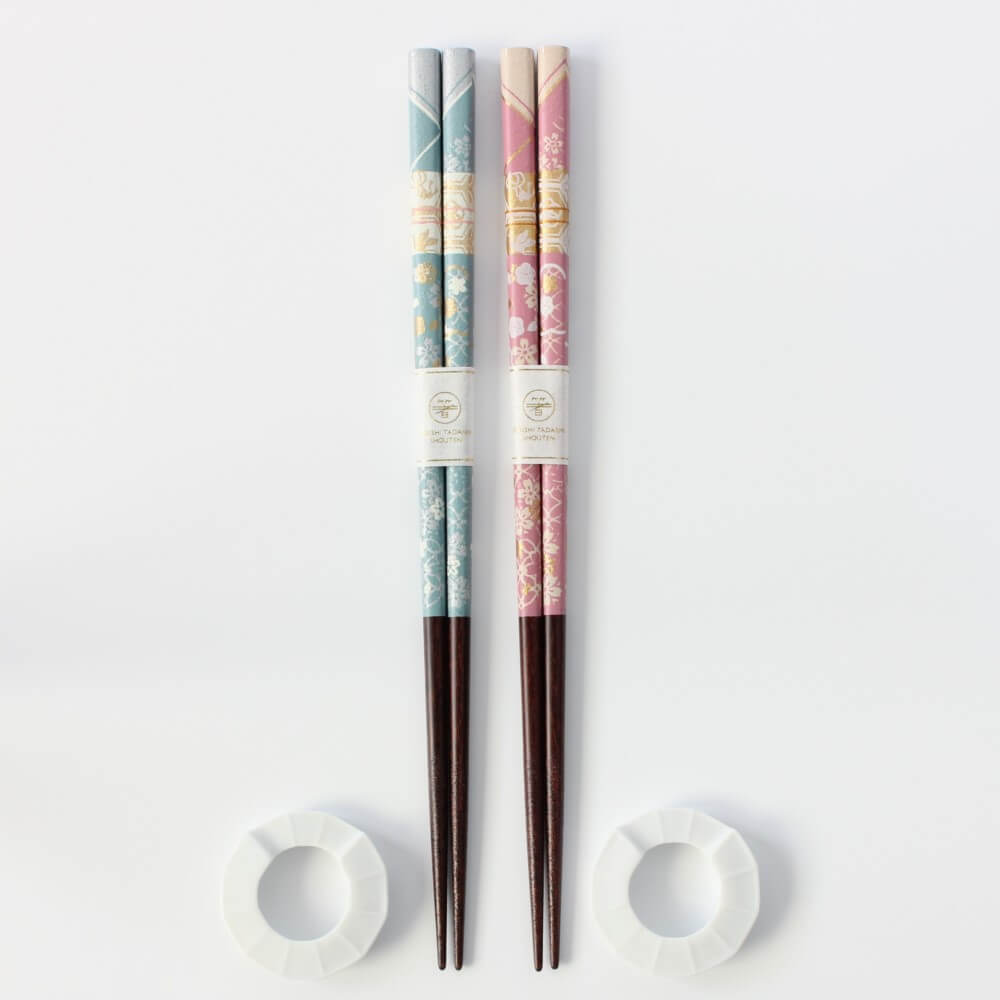 blue and pink kimono designed chopsticks with accompanying round chopsticks rests