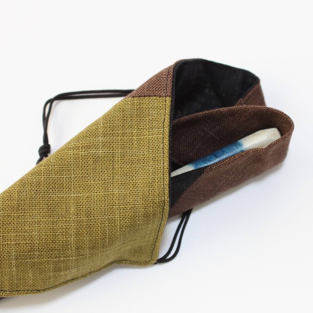 chopsticks inside folded fabric case