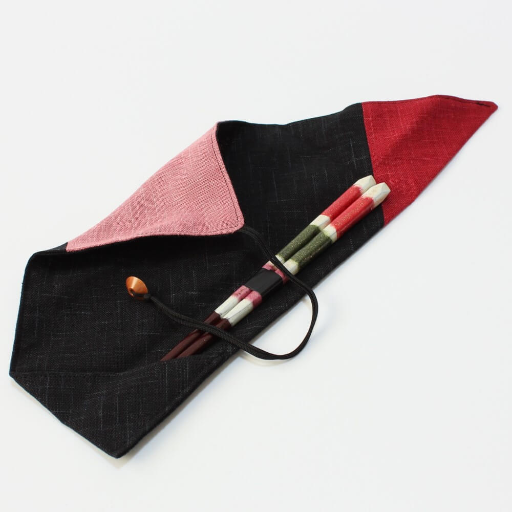 chopsticks tucked inside the wafu pink chopsticks fabric case