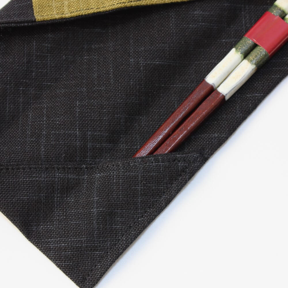 chopsticks tips tucked inside fabric chopsticks case