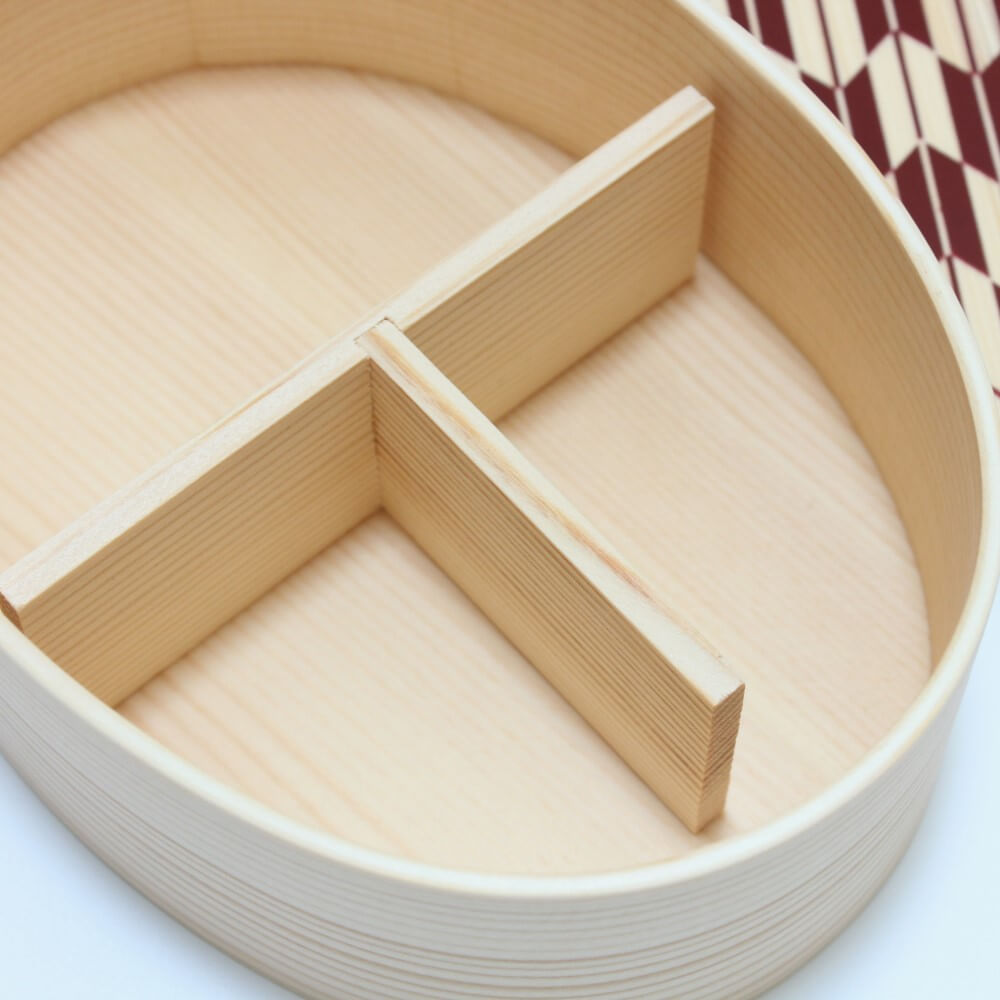 clost up of T divider yabane red magewappa bento box