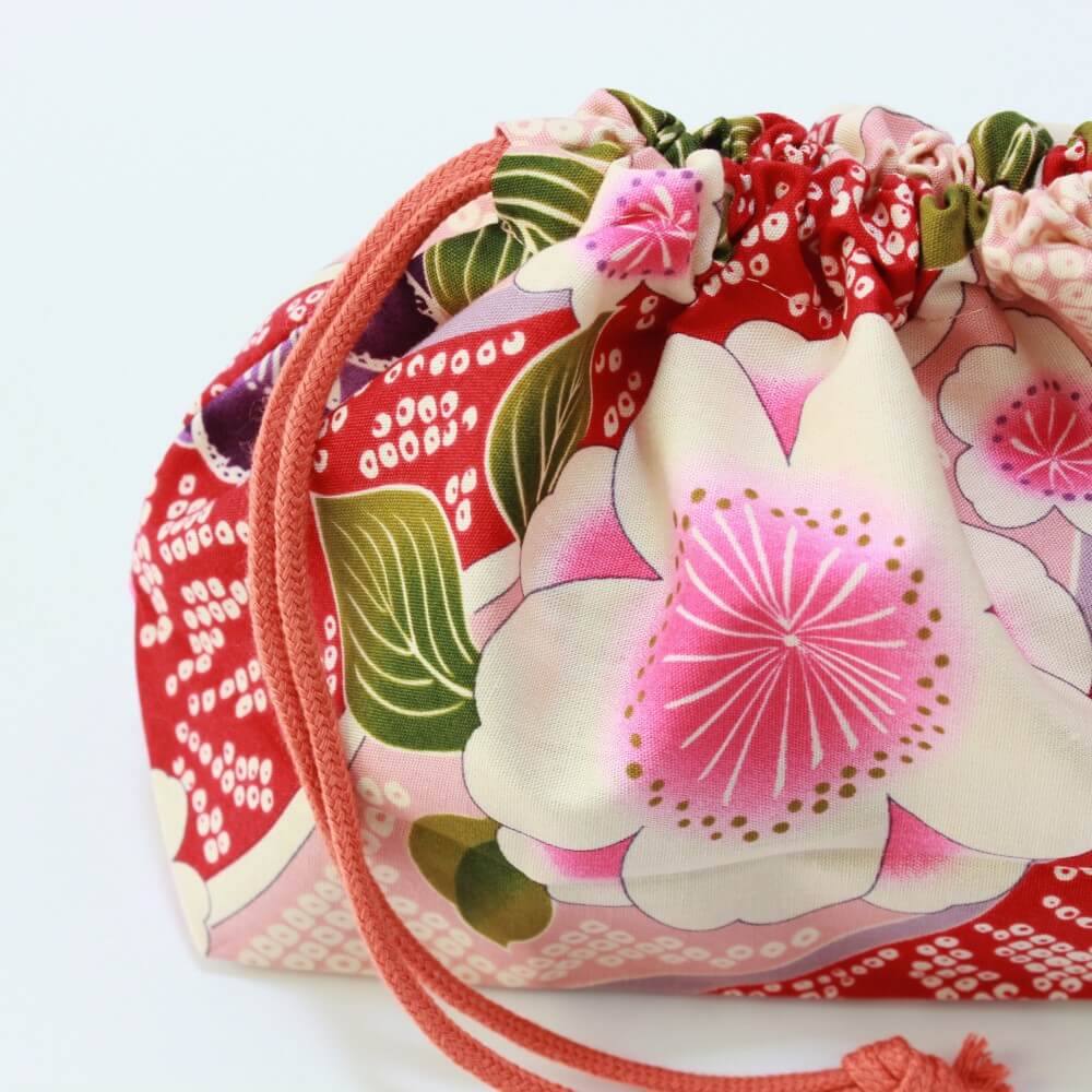 close up side of bento lunch bag sakura blossoms