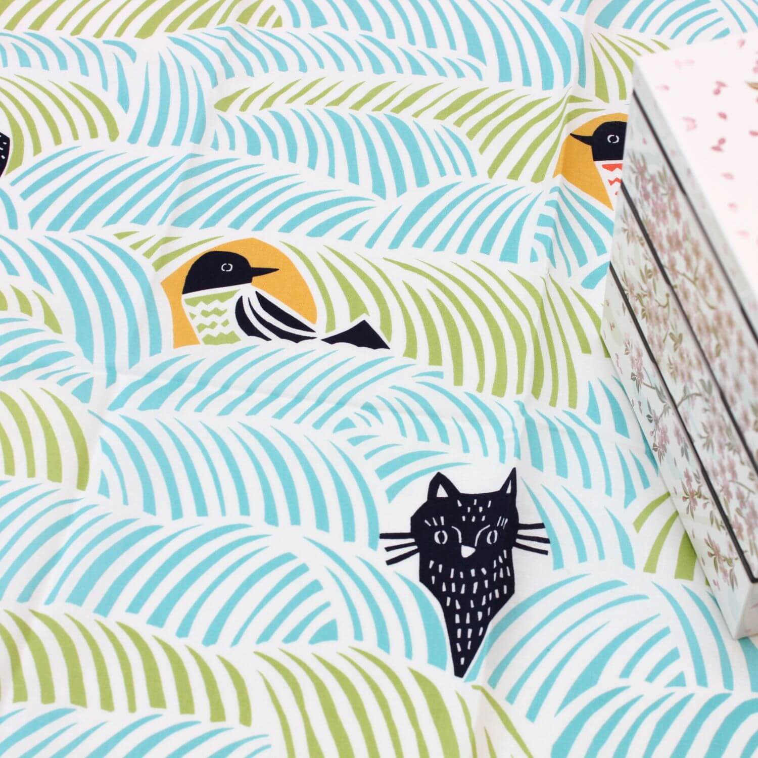 close up of the cat and bird furoshiki by kata kata