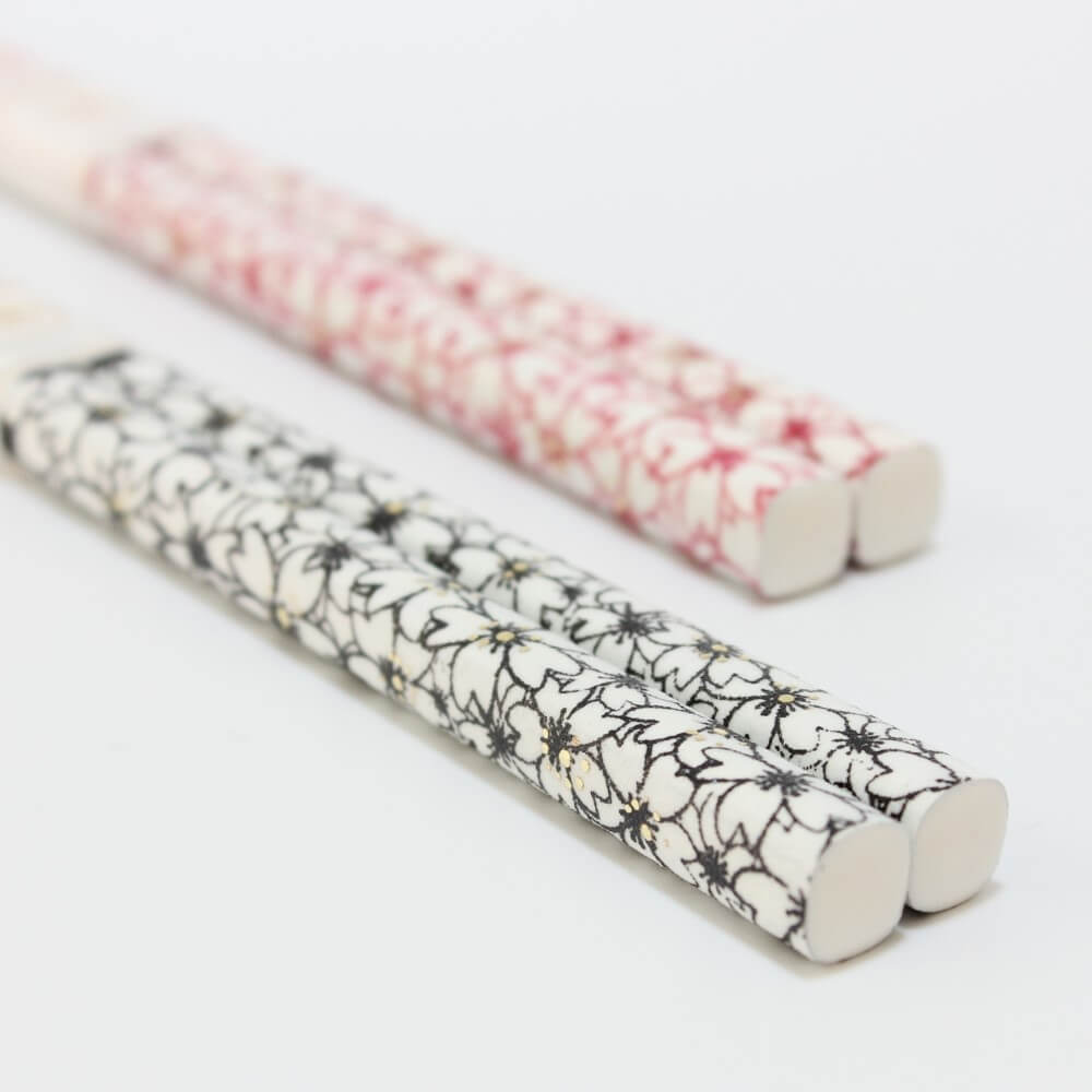 close up black modern sakura chopstick handles