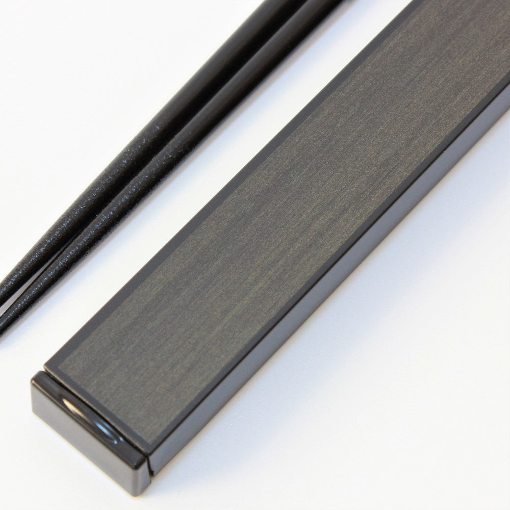 close up of chopsticks case surface showing walnut woodgrain print