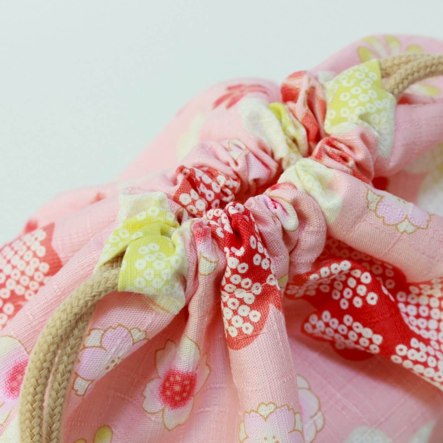 close up of the drawstring closed bento lunch bag